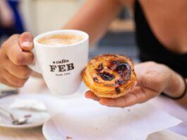 Enjoying a Pastel de nata tart and coffee