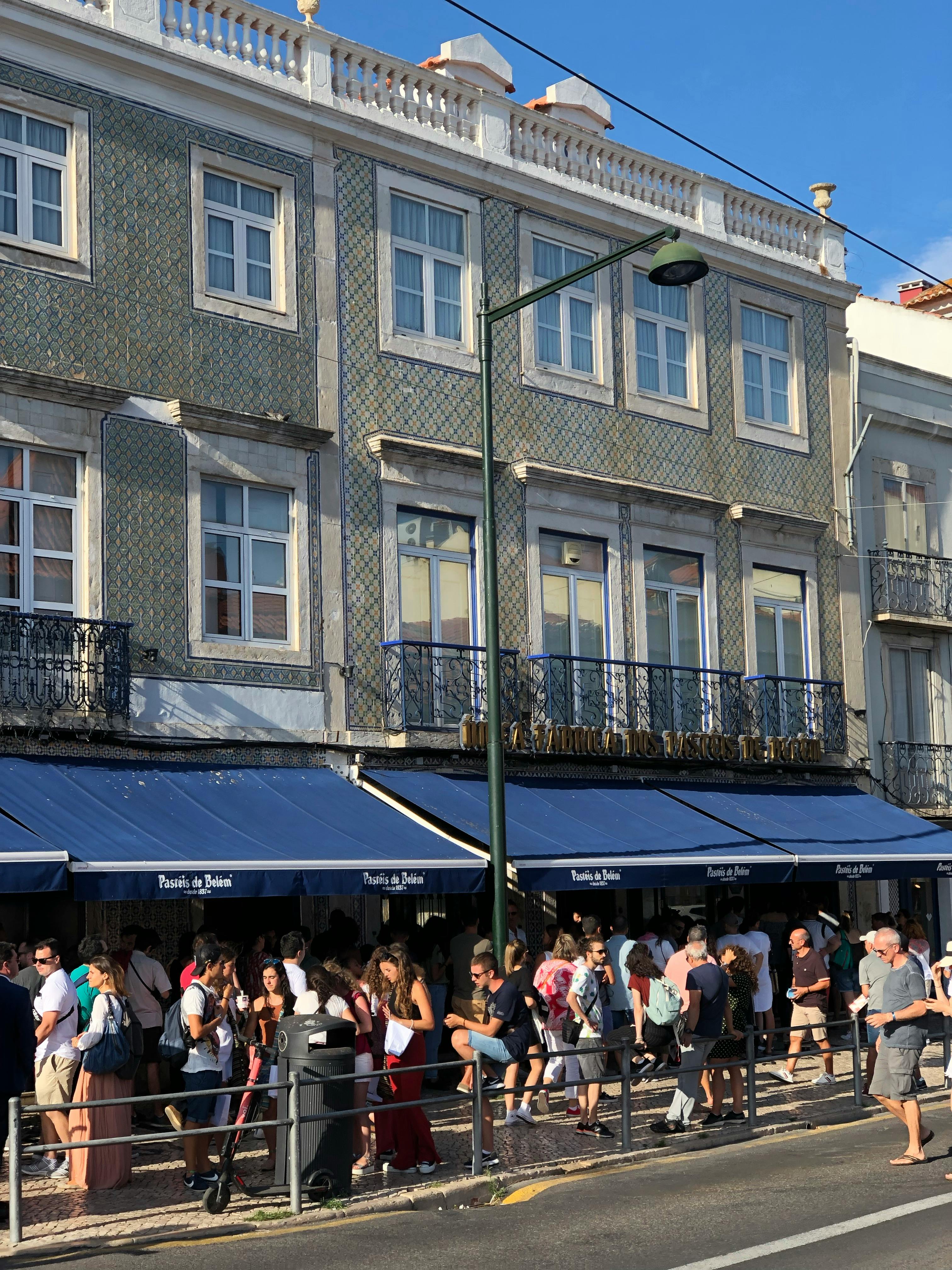 The queue at Pasteis de Bellem, where tens of thousands of tarts are sold daily