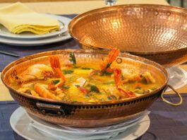 A shellfish cataplana in a traditional pot