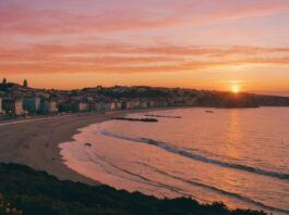 Beautiful Portugal coastline at sunset with colorful sky.