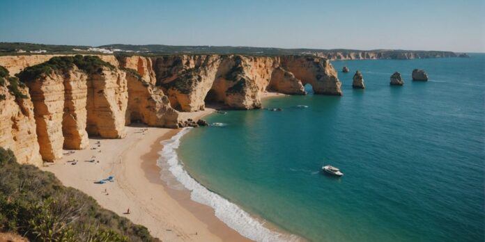 Aerial view of Algarve cliffs and ocean waves in Portugal