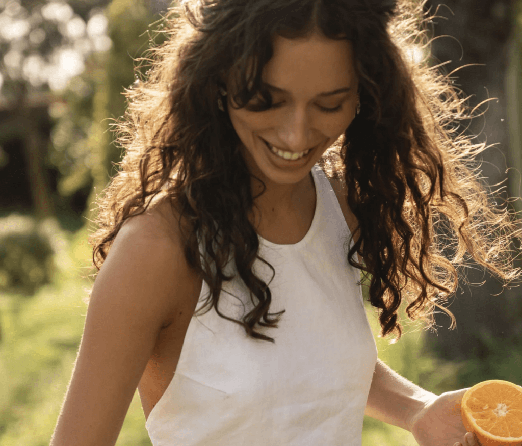 A woman wearing a Naz summer dress