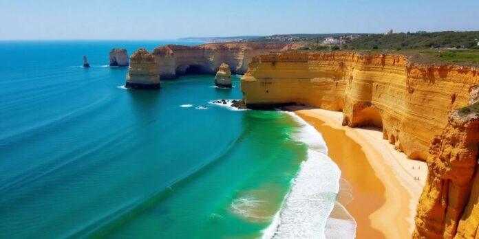 Aerial view of Algarve's coastline with beaches and cliffs.