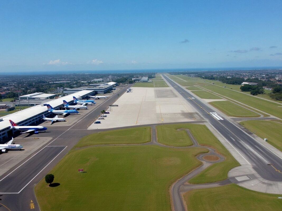 Aerial view of Humberto Delgado Airport with planes.