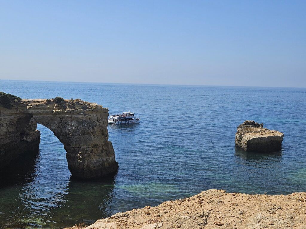 Cliffs and a sea arch off the Algarve coast