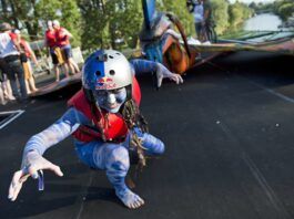 A competitor in teh Red Bull Flugtag poses for the camera