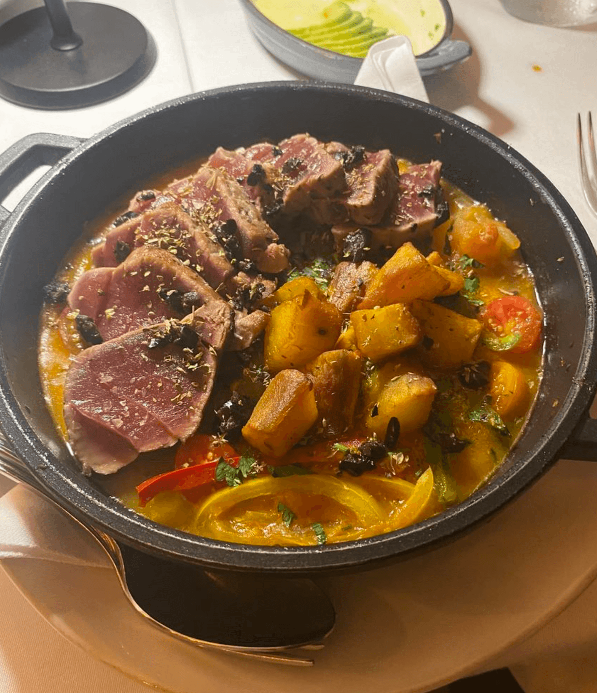 A dish with meat and potatoes