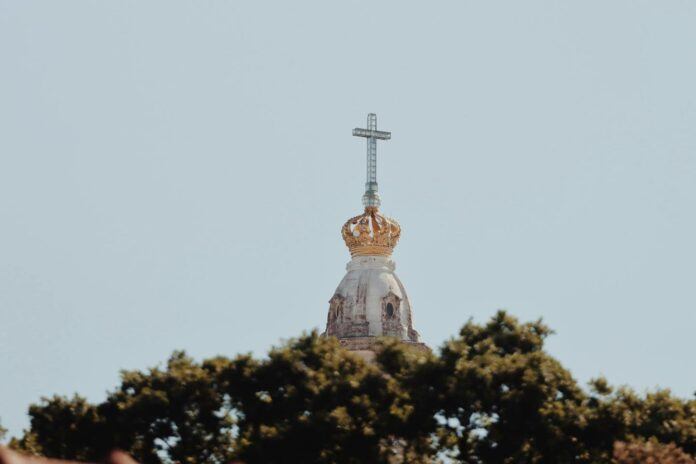 The basilica of the shrine of Fatima seen with trees surrounding it