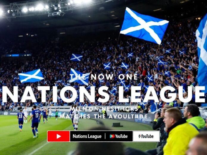 Scottish fans cheering in a stadium during a match.