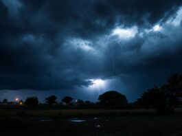 Dark storm clouds with heavy rain and lightning.