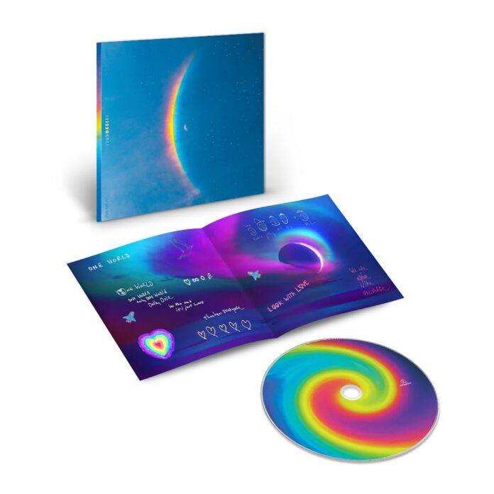 Coldplay album with insert booklet and CD disc with colorful abstract shapes and musical elements.