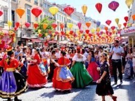 Lively dancers and vibrant decorations at a Lisbon festival.