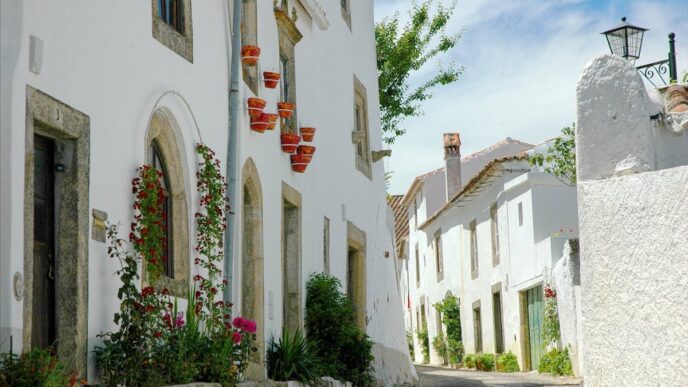 White house on a small street seen in Marvão, Portugal