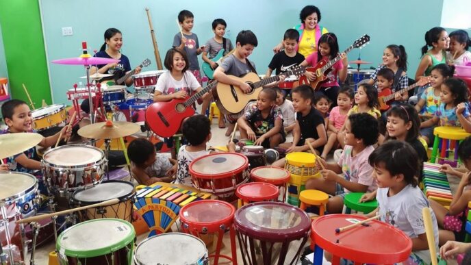 Kids playing musical instruments in a vibrant workshop.