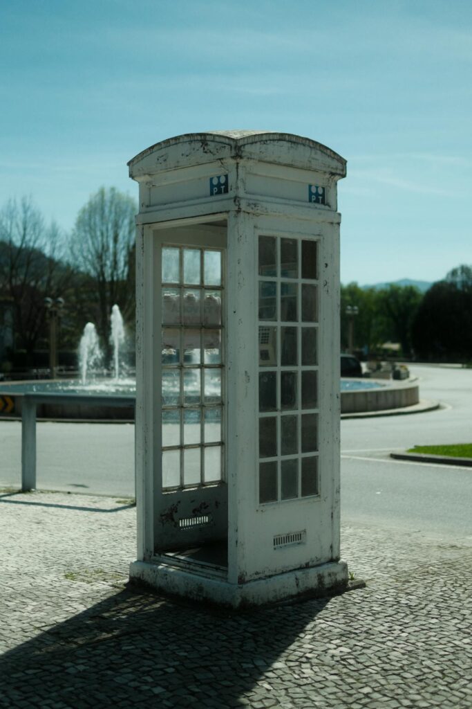 A white, English style telephone box