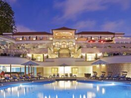 A view of The Yeatman Hotel in the evening with the swimming pool visible in front of teh building.