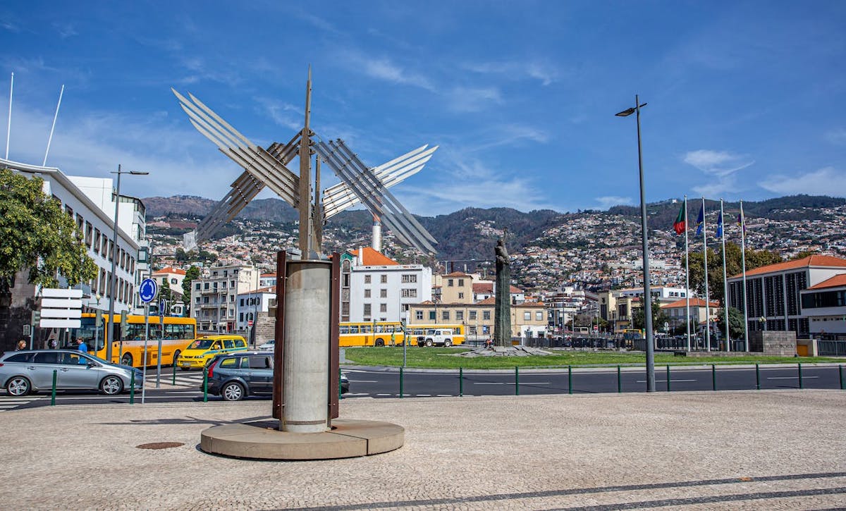 A sculpture of a bird flying in Funchal