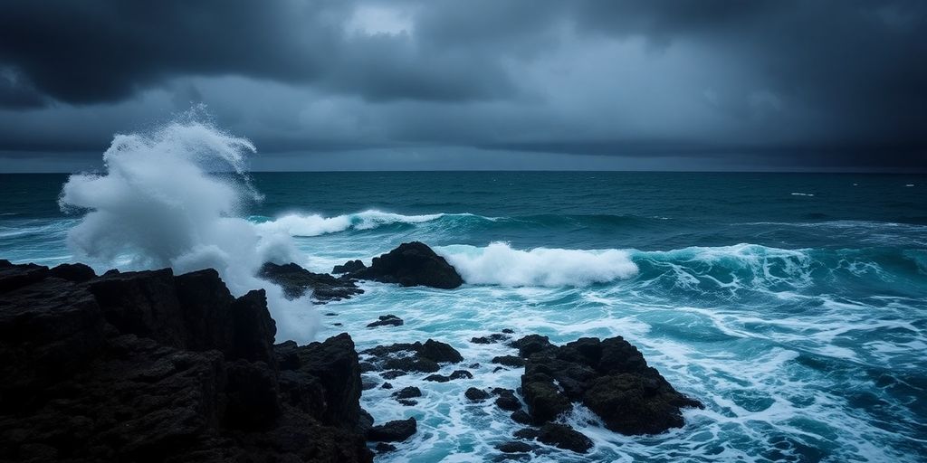 Turbulent ocean waves crashing against cliffs during storm.