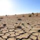 Dry cracked landscape in Alentejo due to drought.