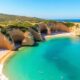 Beautiful coastline of Lagos, Portugal with golden cliffs.