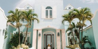 woman sitting in front of building