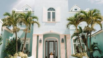 woman sitting in front of building