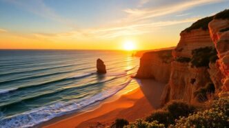 Algarve coast sunset with golden sands and waves.