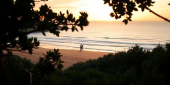 Couple enjoying a romantic sunset on Algarve beach.