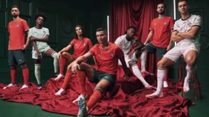 Cristiano Ronaldo and other Portuguese national players, men and women, pose in Portugal national team kit.