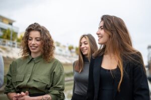 Girls Walking on the Street Smiling