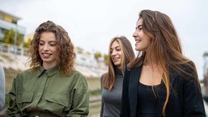 Girls Walking on the Street Smiling