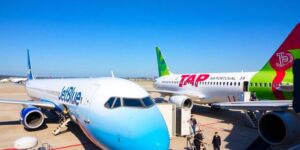 JetBlue and TAP Air Portugal planes at the airport.