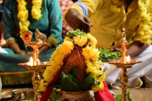 Yellow Flowers Beside a candlestick holder